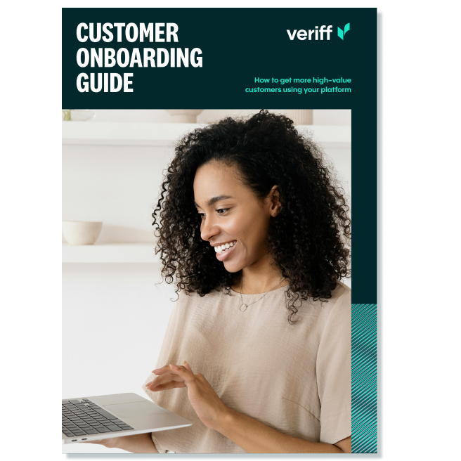 a woman holding a laptop