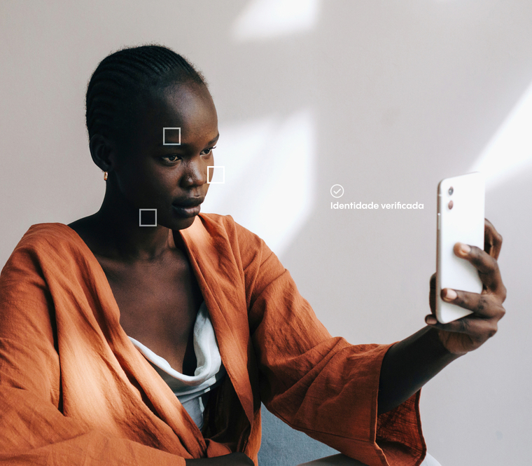 woman's identity being verified with her phone
